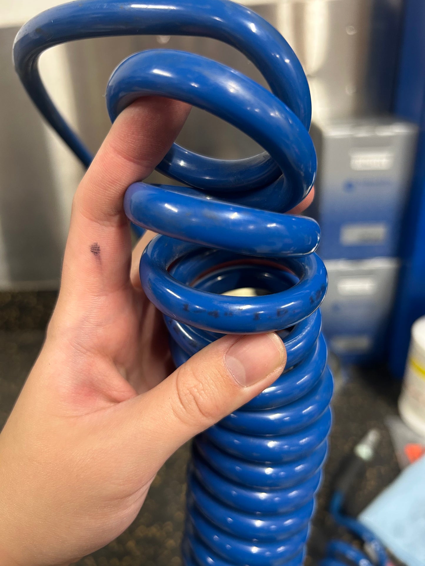 25-Foot 1/4” Diameter Coiled Air Hose with Male/Female Fittings (125 PSI Max Pressure)